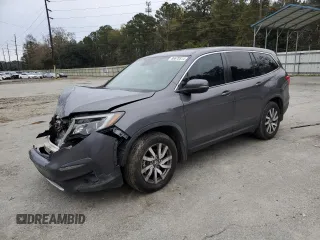 2021 Honda Pilot EX-L with VIN 5FNYF5H56MB042971, listed as a Copart auction lot 86678514 with 57,780 mi miles and Salvage Title. Bid and sale history available at carsss.com. Image 1.