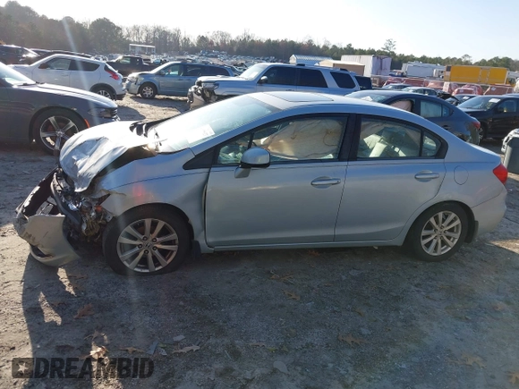 2012 Honda Civic EX-L with VIN 2HGFB2F91CH507657, listed as a IAAI auction lot 41115627 with 253,242 mi miles and . Bid and sale history available at DreamBid. Image 14.