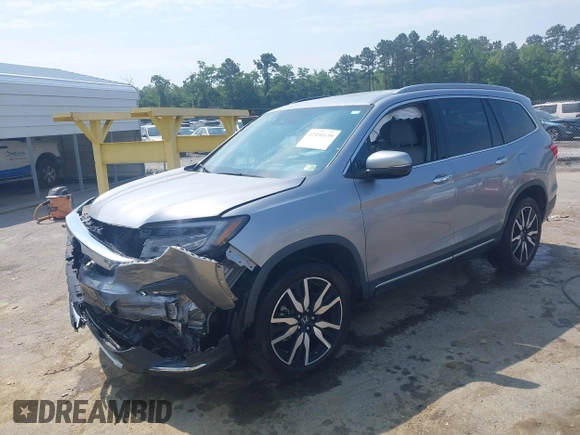 2019 Honda Pilot Elite with VIN 5FNYF6H08KB025449, listed as a IAAI auction lot 42450139 with 98,368 mi miles and . Bid and sale history available at DreamBid. Image 2.