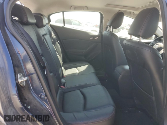 2015 Mazda 3 i Grand Touring z VIN 3MZBM1M72FM145070, wystawiony jako Copart lot #58419525 z przebiegiem 61 255 mil mil oraz Szkoda całkowita • Salvage title. Historia ofert i sprzedaży dostępna na DreamBid. Obrazek 10.