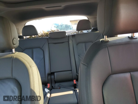 2019 Audi Q3 Premium with VIN WA1AECF38K1076355, listed as a Copart auction lot 74242994 with 86,594 mi miles and Salvage Title. Bid and sale history available at carsss.com. Image 10.