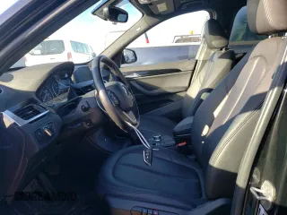 2018 BMW X1 xDrive28i with VIN WBXHT3C38J5K24660, listed as a Copart auction lot 44387043 with 59,786 mi miles. Bid and sale history available at carsss.com. Image 7.