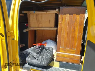 2012 Ford Econoline Cargo Commercial with VIN 1FTNE2EL7CDA09376, listed as a IAAI auction lot 42385074 with 161,909 mi miles and . Bid and sale history available at DreamBid. Image 8.