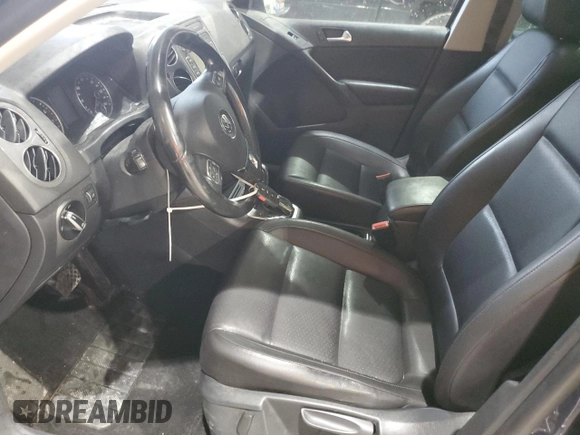 2013 Volkswagen Tiguan S with VIN WVGAV3AX7DW069012, listed as a Copart auction lot 55720975 with 133,381 mi miles and Salvage title. Bid and sale history available at DreamBid. Image 7.