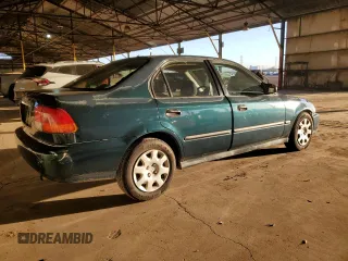 1997 Honda Civic DX with VIN JHMEJ6623VS028089, listed as a Copart auction lot 78659644 with 194,593 mi miles and Salvage Title. Bid and sale history available at DreamBid. Image 3.