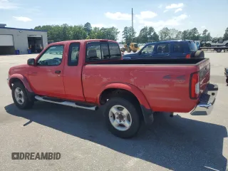 2000 Nissan Frontier XE z VIN 1N6ED26Y7YC392971, wystawiony jako Copart lot #61301035 z przebiegiem 182 149 mil mil oraz Czysty tytuł • Clean title. Historia ofert i sprzedaży dostępna na DreamBid. Obrazek 2.