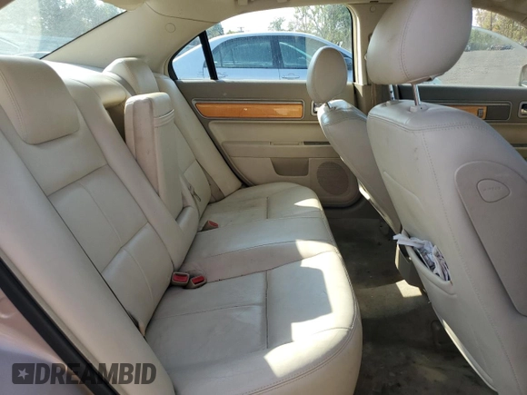 2006 Lincoln Zephyr z VIN 3LNHM26126R626690, wystawiony jako Copart lot #71560864 z przebiegiem 136 886 mil mil oraz Szkoda całkowita • Salvage title. Historia ofert i sprzedaży dostępna na DreamBid. Obrazek 10.