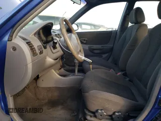 2000 Hyundai Accent z VIN KMHCG45GXYU125691, wystawiony jako Copart lot #87253294 z przebiegiem 91 062 mil mil oraz Szkoda całkowita • Salvage title. Historia ofert i sprzedaży dostępna na DreamBid. Obrazek 7.