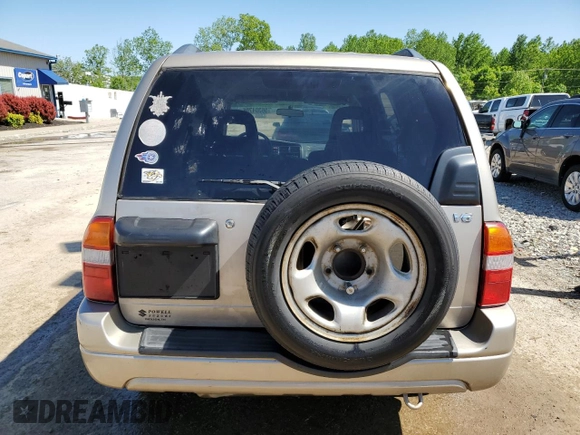 2002 Suzuki XL7 Standard z VIN JS3TY92V524108548, wystawiony jako Copart lot #56304705 z przebiegiem 288 201 mil mil oraz Nie do naprawy • Non repairable. Historia ofert i sprzedaży dostępna na DreamBid. Obrazek 6.
