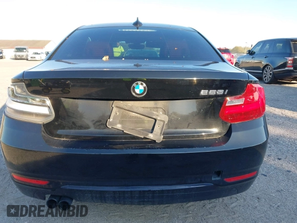 2015 BMW 2 Series 228i with VIN WBA1F5C58FV257021, listed as a IAAI auction lot 41318026 with 154,906 mi miles. Bid and sale history available at carsss.com. Image 16.