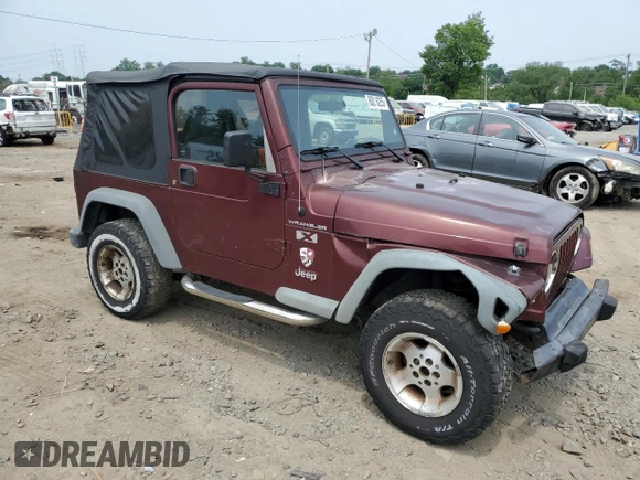2002 Jeep Wrangler X z VIN 1J4FA39S42P773815, wystawiony jako Copart lot #60016255 z przebiegiem 174 803 mil mil oraz Szkoda całkowita • Salvage title. Historia ofert i sprzedaży dostępna na DreamBid. Obrazek 4.