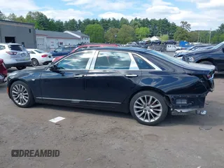 2019 Cadillac CT6 Premium Luxury AWD with VIN 1G6KD5RS3KU123885, listed as a IAAI auction lot 42200429 with 66,611 mi miles and . Bid and sale history available at DreamBid. Image 14.