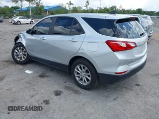 2020 Chevrolet Equinox LS z VIN 3GNAXHEV8LS696940, wystawiony jako IAAI lot #42153761 z przebiegiem 60 309 mil mil oraz . Historia ofert i sprzedaży dostępna na DreamBid. Obrazek 3.