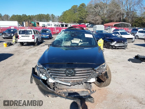 2018 Mazda CX-9 Grand Touring z VIN JM3TCADY5J0204845, wystawiony jako IAAI lot #41292695 z przebiegiem 98 751 mil mil oraz . Historia ofert i sprzedaży dostępna na DreamBid. Obrazek 6.