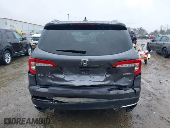2021 Honda Pilot Touring 8-Passenger with VIN 5FNYF5H9XMB014190, listed as a IAAI auction lot 41749586 with 67,602 mi miles and . Bid and sale history available at DreamBid. Image 17.