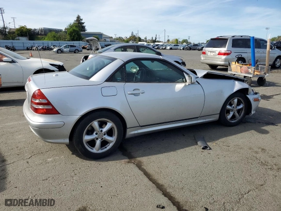 2002 Mercedes-Benz SLK-Class 3.2L with VIN WDBKK65F22F253077, listed as a Copart auction lot 50562985 with 152,195 mi miles and Salvage Title. Bid and sale history available at carsss.com. Image 3.