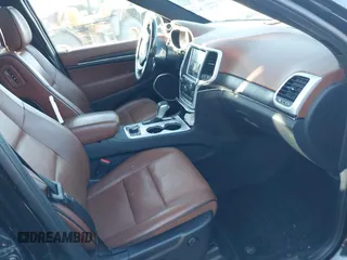 2018 Jeep Grand Cherokee Summit with VIN 1C4RJFJG1JC211047, listed as a IAAI auction lot 41133865 with 66,588 mi miles and . Bid and sale history available at DreamBid. Image 5.