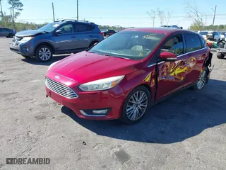 2015 Ford Focus Titanium with VIN 1FADP3N28FL215499, listed as a IAAI auction lot 41839092 with 152,102 mi miles. Bid and sale history available at carsss.com. Image 16.