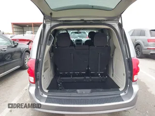 2014 Dodge Grand Caravan SXT with VIN 2C4RDGCG0ER417662, listed as a IAAI auction lot 41933279 with 156,751 mi miles and . Bid and sale history available at DreamBid. Image 18.