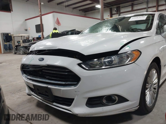 2013 Ford Fusion SE Hybrid with VIN 3FA6P0LU7DR254983, listed as a IAAI auction lot 41883531 with 188,585 mi miles and . Bid and sale history available at carsss.com. Image 14.