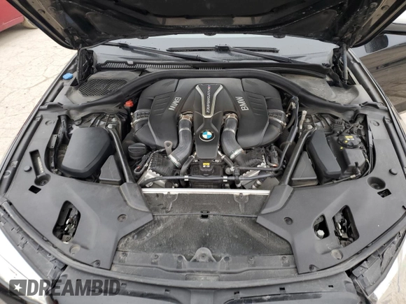 2018 BMW 5 Series M550i xDrive with VIN WBAJB9C56JB049524, listed as a Copart auction lot 43511805 with 55,759 mi miles and Salvage title. Bid and sale history available at DreamBid. Image 11.