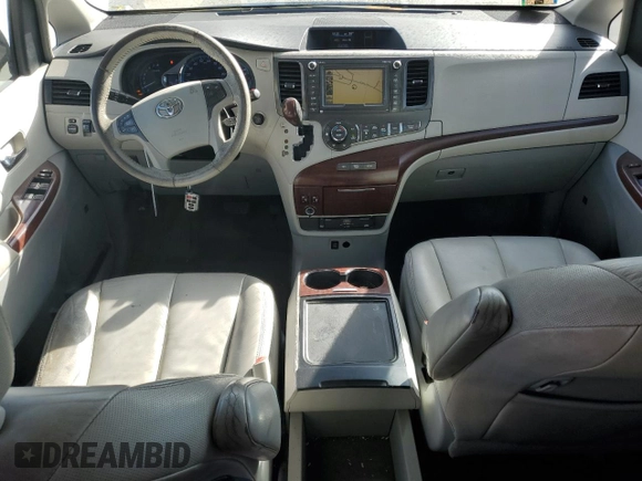 2012 Toyota Sienna XLE z VIN 5TDDK3DC5CS033868, wystawiony jako Copart lot #74727814 z przebiegiem 98 798 mil mil oraz Szkoda całkowita • Salvage title. Historia ofert i sprzedaży dostępna na DreamBid. Obrazek 8.