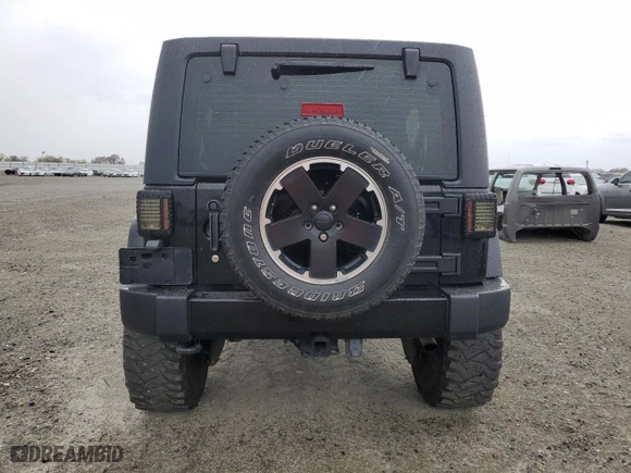 2012 Jeep Wrangler Unlimited Sahara with VIN 1C4HJWEG4CL269873, listed as a Copart auction lot 49000475 with 176,135 mi miles and Clean Title. Bid and sale history available at carsss.com. Image 6.