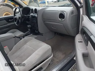 2009 GMC Envoy SLE with VIN 1GKDS33S892108589, listed as a IAAI auction lot 41883738 with 172,027 mi miles. Bid and sale history available at carsss.com. Image 5.