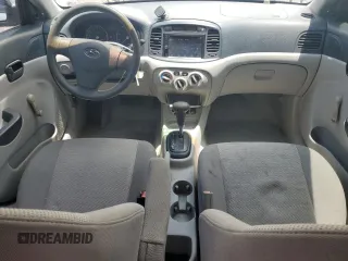2006 Hyundai Accent GLS z VIN KMHCN46C46U060741, wystawiony jako Copart lot #59560575 z przebiegiem 93 966 mil mil oraz Szkoda całkowita • Salvage title. Historia ofert i sprzedaży dostępna na DreamBid. Obrazek 8.
