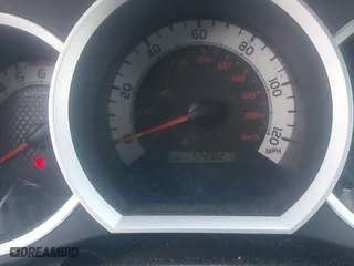 2014 Toyota Tacoma with VIN 5TFLU4EN9EX099414, listed as a IAAI auction lot 40528514 with 122,827 mi miles. Bid and sale history available at carsss.com. Image 7.
