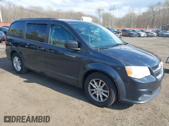 2013 Dodge Grand Caravan SXT with VIN 2C4RDGCG2DR652708, listed as a IAAI auction lot 42043026 with 245,442 mi miles and . Bid and sale history available at DreamBid. Image 1.