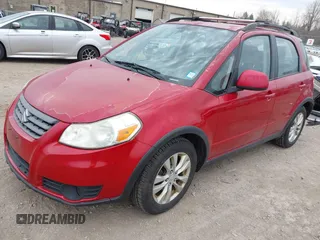 2013 Suzuki SX4 Crossover with VIN JS2YB5A37D6101984, listed as a IAAI auction lot 42121276 with 136,073 mi miles. Bid and sale history available at carsss.com. Image 2.