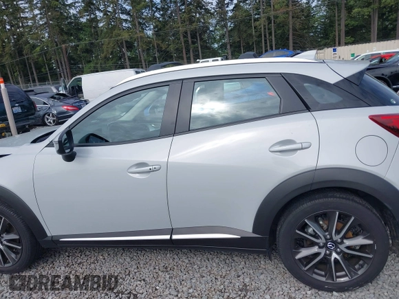 2017 Mazda CX-3 Grand Touring z VIN JM1DKFD70H0159621, wystawiony jako IAAI lot #42331482 z przebiegiem 55 166 mil mil oraz . Historia ofert i sprzedaży dostępna na DreamBid. Obrazek 14.