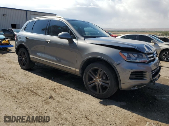 2013 Volkswagen Touareg Sport с VIN WVGEP9BP0DD010408, выставлен на аукционе Copart как лот 75854084 с пробегом 159 863 миль миль и Списание • Salvage title. История ставок и продаж доступна на DreamBid. Изображение 4.