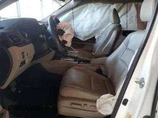 2018 Honda Pilot Touring с VIN 5FNYF6H98JB053524, выставлен на аукционе Copart как лот 61447785 с пробегом 114 942 миль миль и Списание • Salvage title. История ставок и продаж доступна на DreamBid. Изображение 7.
