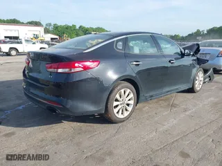 2016 Kia Optima EX with VIN 5XXGU4L3XGG033323, listed as a IAAI auction lot 42088998 with 134,686 mi miles. Bid and sale history available at carsss.com. Image 4.