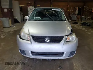 2010 Suzuki SX4 with VIN JS2YC5A49A6310256, listed as a Copart auction lot 73210584 with 135,021 mi miles and Salvage Title. Bid and sale history available at DreamBid. Image 5.