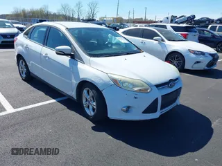 2013 Ford Focus SE with VIN 1FADP3F22DL265312, listed as a IAAI auction lot 41872863 with 217,052 mi miles. Bid and sale history available at carsss.com. Image 1.