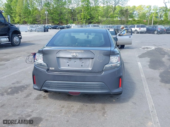 2015 Scion tC with VIN JTKJF5C71FJ013747, listed as a IAAI auction lot 42087740 with 138,097 mi miles. Bid and sale history available at carsss.com. Image 16.