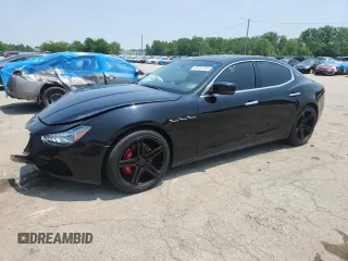 2014 Maserati Ghibli S Q4 with VIN ZAM57RTA5E1122165, listed as a Copart auction lot 60257835 with Not provided miles and Salvage title. Bid and sale history available at DreamBid. Image 1.