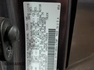2014 Toyota Tacoma with VIN 5TFLU4ENXEX089927, listed as a Copart auction lot 52140565 with 112,924 mi miles and Salvage Title. Bid and sale history available at DreamBid. Image 12.