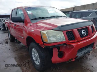 2005 Nissan Titan SE with VIN 1N6AA07B25N553619, listed as a IAAI auction lot 41560930 with 169,561 mi miles. Bid and sale history available at carsss.com. Image 6.
