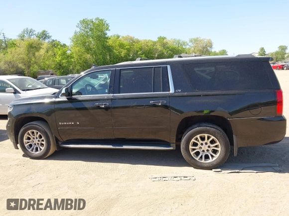 2016 Chevrolet Suburban LTZ with VIN 1GNSKJKC5GR328723, listed as a IAAI auction lot 42253610 with 183,423 mi miles and . Bid and sale history available at DreamBid. Image 14.