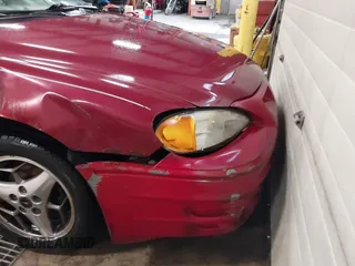 2004 Pontiac Grand Am SE with VIN 1G2NE52F94C247452, listed as a IAAI auction lot 41480289 with 154,690 mi miles. Bid and sale history available at carsss.com. Image 15.
