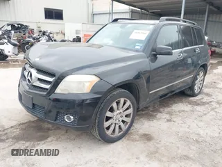 2012 Mercedes-Benz GLK with VIN WDCGG5GB7CF733494, listed as a IAAI auction lot 41933946 with 187,027 mi miles. Bid and sale history available at carsss.com. Image 2.