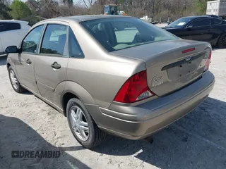 2004 Ford Focus SE with VIN 1FAFP34364W187989, listed as a IAAI auction lot 41838413 with 111,406 mi miles and . Bid and sale history available at DreamBid. Image 3.