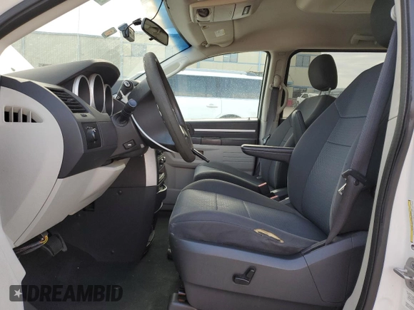 2010 Dodge Grand Caravan SE with VIN 2D4RN4DE9AR237795, listed as a Copart auction lot 55561025 with 212,109 mi miles and Clean Title. Bid and sale history available at DreamBid. Image 7.
