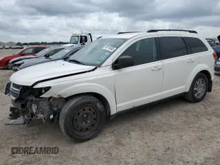 2014 Dodge Journey SE with VIN 3C4PDCAB7ET240936, listed as a Copart auction lot 55115645 with 242,155 mi miles and Salvage title. Bid and sale history available at DreamBid. Image 1.