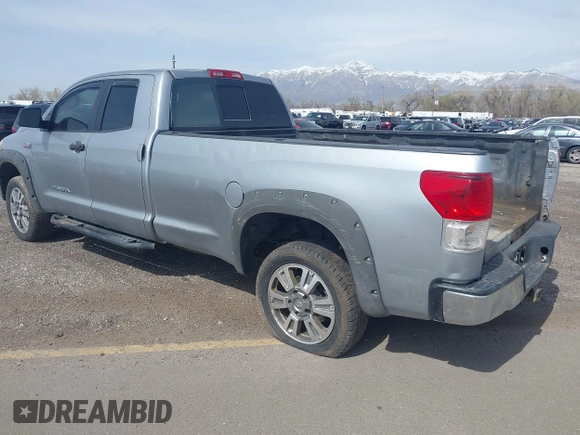 2012 Toyota Tundra 4WD Truck SR with VIN 5TFCW5F19CX012832, listed as a IAAI auction lot 41726453 with 232,078 mi miles. Bid and sale history available at carsss.com. Image 3.