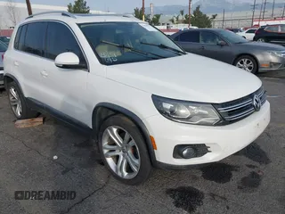2012 Volkswagen Tiguan SE z VIN WVGAV7AX6CW535969, wystawiony jako IAAI lot #41464523 z przebiegiem 138 858 mil mil oraz . Historia ofert i sprzedaży dostępna na DreamBid. Obrazek 1.